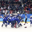 GANGNEUNG, SOUTH KOREA - FEBRUARY 22: USA players celebrate after a 3-2 shoot-out win against Canada during gold medal game action at the PyeongChang 2018 Olympic Winter Games. (Photo by Andre Ringuette/HHOF-IIHF Images)

